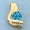 Swiss Blue Topaz And Diamond Pendant In 10k Yellow Gold