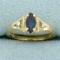 Marquise Sapphire And Diamond Ring In 10k Yellow Gold