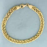 Italian Made Braided Link Bracelet In 14k Yellow Gold
