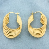 Twisting Hoop Earrings In 14k Yellow Gold