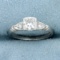 Vintage Three Stone Diamond Engagement Ring In Platinum