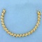 Designer 1ct Tw Diamond Spiral Link Tennis Bracelet In 14k Yellow Gold