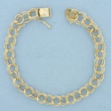 Double Ring Charm Bracelet In 14k Yellow Gold