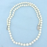 20 Inch Graduated Cultured Pearl Hand Knotted Strand Necklace In 14k White Gold