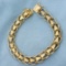 7 3/4 Inch Double Flower Design Bracelet In 14k Yellow Gold