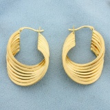 Twisting Hoop Earrings In 14k Yellow Gold