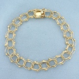 8 Inch Triple Loop Charm Bracelet In 14k Yellow Gold