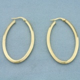 Large Oval Hoop Earrings In 14k Yellow Gold
