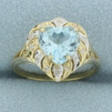 Heart Shaped Blue Topaz And Diamond Ring In 14k Yellow And White Gold