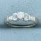 Vintage Round And Baguette Diamond Engagement Ring In 14k White Gold
