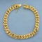 Diamond Cut Curb Link Bracelet With Heart Clasp In 22k Yellow Gold