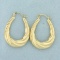 Twisting Hoop Earrings In 14k Yellow Gold