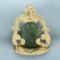 Hand Carved Jade Buddha Pendant In 14k Yellow Gold