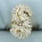 Diamond Swoosh Design Baguette And Round Diamond Ring In 14k Yellow Gold