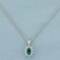 Emerald And Diamond Halo Pendant On Chain In 14k White Gold