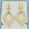 Diamond Shape Cut Out Dangle Earrings In 14k Yellow Gold