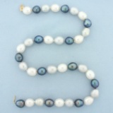18 Inch Multi Colored Baroque Hand Knotted Pearl Strand In 14k Yellow Gold