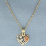 Tri Color Flower Heart Necklace In 14k Yellow, White, And Rose Gold