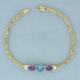 Blue Topaz, Amethyst, And Diamond Bracelet In 14k Yellow Gold
