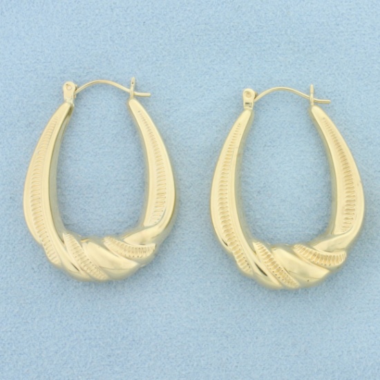 Twisting Design Oval Hoop Earrings In 14k Yellow Gold