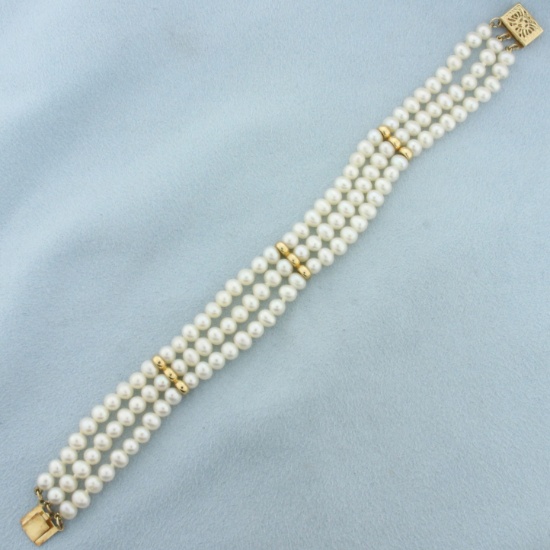 Triple Strand Cultured Pearl Bracelet In 14k Yellow Gold