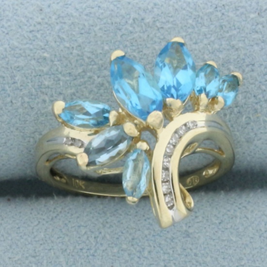 Blue Topaz And Diamond Spray Design Ring In 10k Yellow Gold