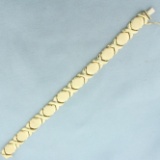 X's And O's Matte And High Polish Bracelet In 14k Yellow Gold