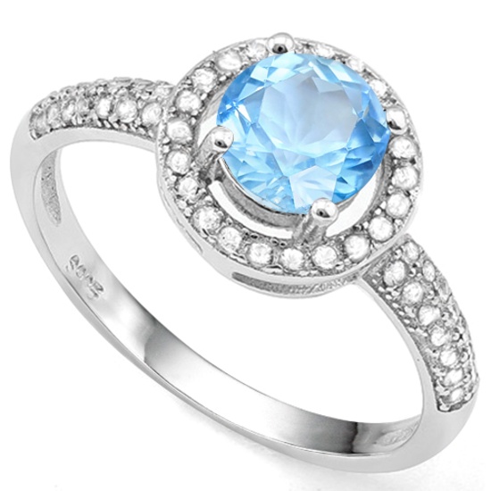 Sky Blue Topaz And White Sapphire Halo Ring In Sterling Silver