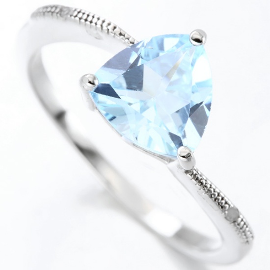 Blue Topaz And Diamond Ring In Sterling Silver