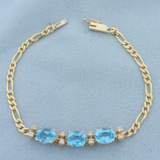 Swiss Blue Topaz And Diamond Figaro Bracelet In 14k Yellow Gold