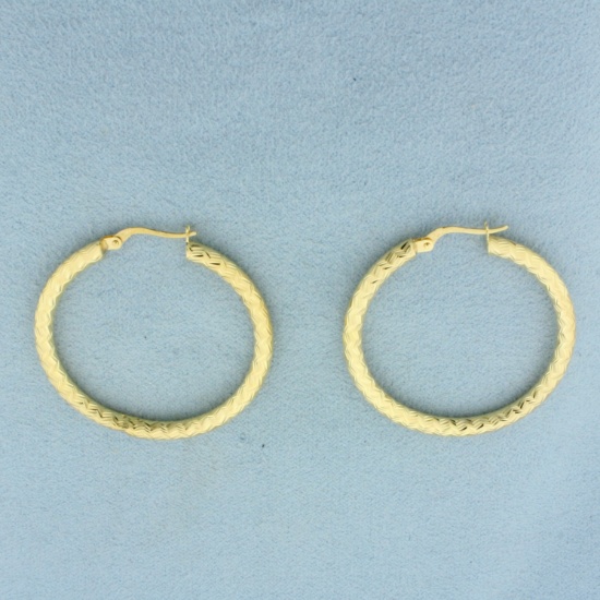Diamond Cut Zigzag Design Hoop Earrings In 14k Yellow Gold
