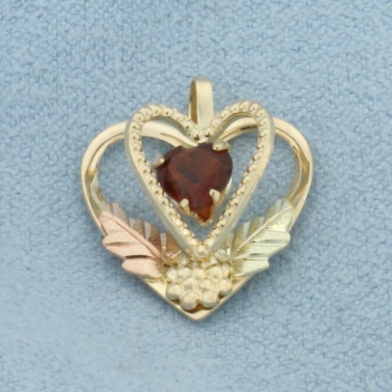 Unique Garnet Heart Pendant In 10k Yellow And Rose Gold