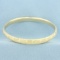 Sandblast And Diamond Cut Finish Hinged Bangle Bracelet In 14k Yellow Gold