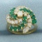 Emerald And Diamond Swirl Design Ring In 14k Yellow Gold