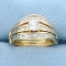 Vintage Baguette And Round Diamond Engagement Ring In 14k Yellow Gold