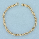 Love Knot Link Bracelet In 14k Yellow Gold