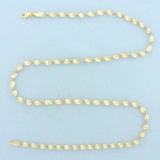 Italian 20 Inch Twisting Herringbone Link Chain Necklace In 14k Yellow Gold