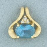 Swiss Blue Topaz And Diamond Pendant In 14k Yellow Gold