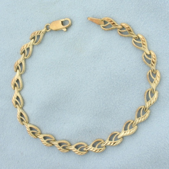 Diamond Cut Designer Heart Link Bracelet In 10k Yellow Gold