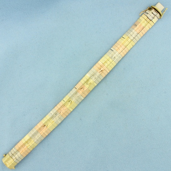 Tri Color Diamond Cut Omega Bracelet In 14k Yellow, Rose, And White Gold