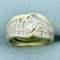 Vintage Round And Baguette Diamond Engagement Ring In 14k Yellow And White Gold