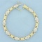 Diamond Evil Eye Design Two Tone Bracelet In 14k Yellow And White Gold