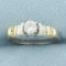 Round And Baguette Diamond Engagement Ring In 14k Yellow And White Gold