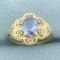 Tanzanite And Diamond Ring In 14k Yellow Gold