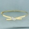 Criss Cross Hinged Bangle Bracelet In 14k Yellow Gold