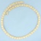 Satin And High Gloss Finish X And O Necklace In 10k Yellow Gold