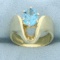 Fancy Oval Cut Swiss Blue Topaz Ring In 14k Yellow Gold