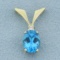 Swiss Blue Topaz And Diamond Pendant In 14k Yellow Gold