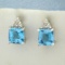 Swiss Blue Topaz And Diamond Earrings In 14k White Gold