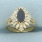 Sapphire And Diamond Halo Ring In 14k Yellow Gold